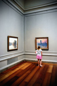 child in front of a monet